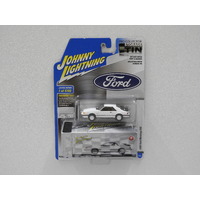1:64 1985 Ford Mustang SVO (Oxford White) - Johnny Lightning "Storage Tin"
