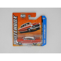 1:64 1955 Cadillac Fleetwood (Red/White) - Matchbox Short Card