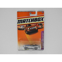 1:64 1965 Shelby Cobra 427 S/C (Silver/Blue Stripes) - Matchbox Long Card