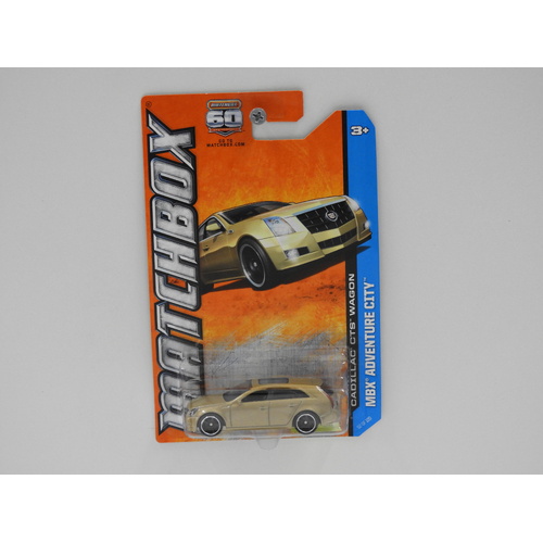 1:64 Cadillac CTS Wagon (Gold) - Matchbox Long Card